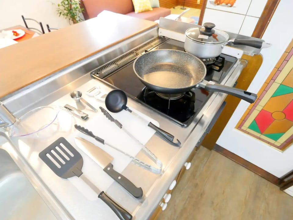 Cooking utensils are also provided.