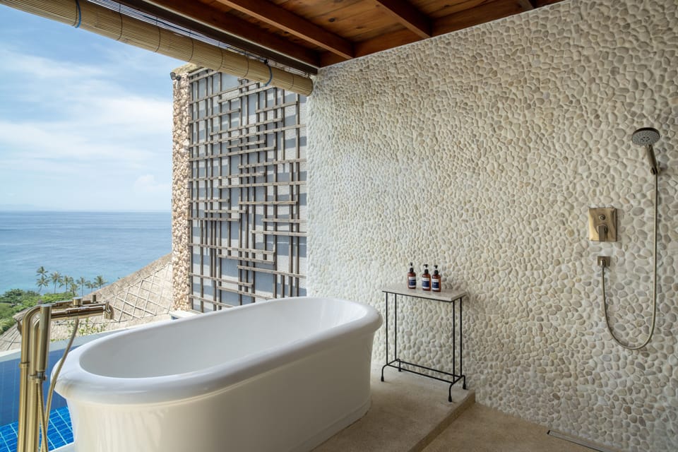 Separate tub and shower, rainfall showerhead, free toiletries