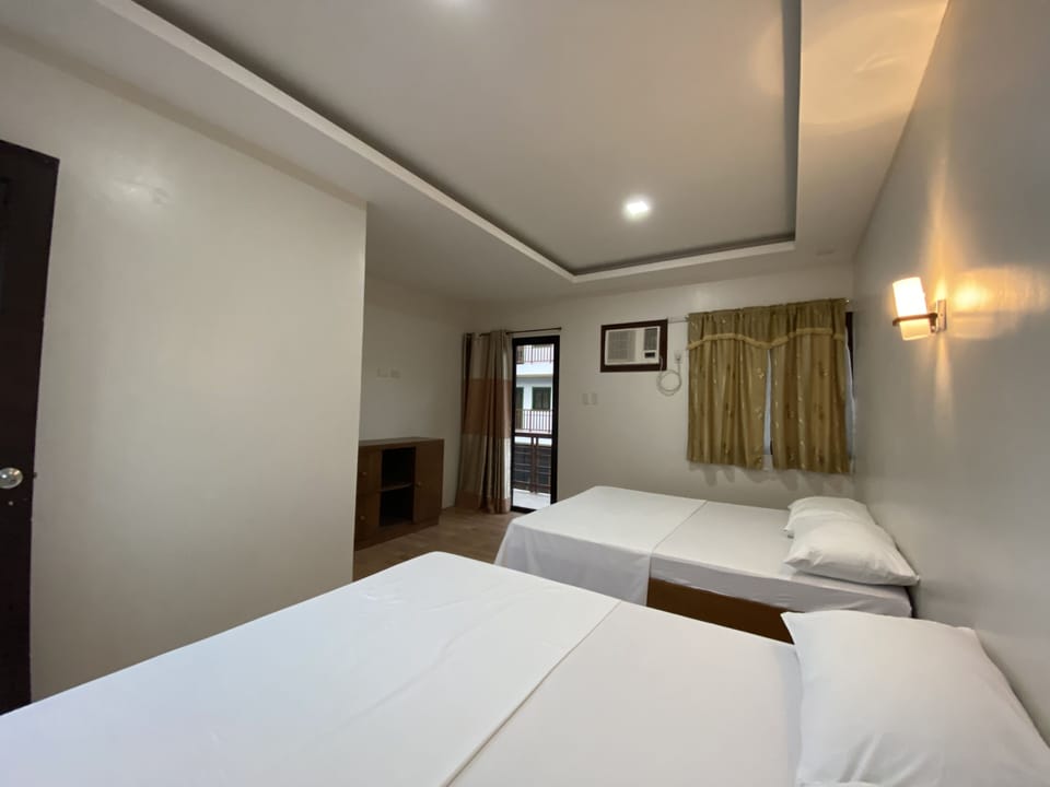 Quadruple Room | Bed sheets
