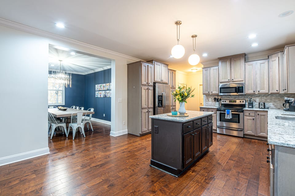 The updated, open concept kitchen allows you to prepare a meal while still enjoying time with your family in the dining room or living room.
