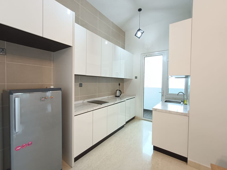 Romantic Apartment | Private kitchen | Full-size fridge, cookware/dishes/utensils, freezer, dining tables