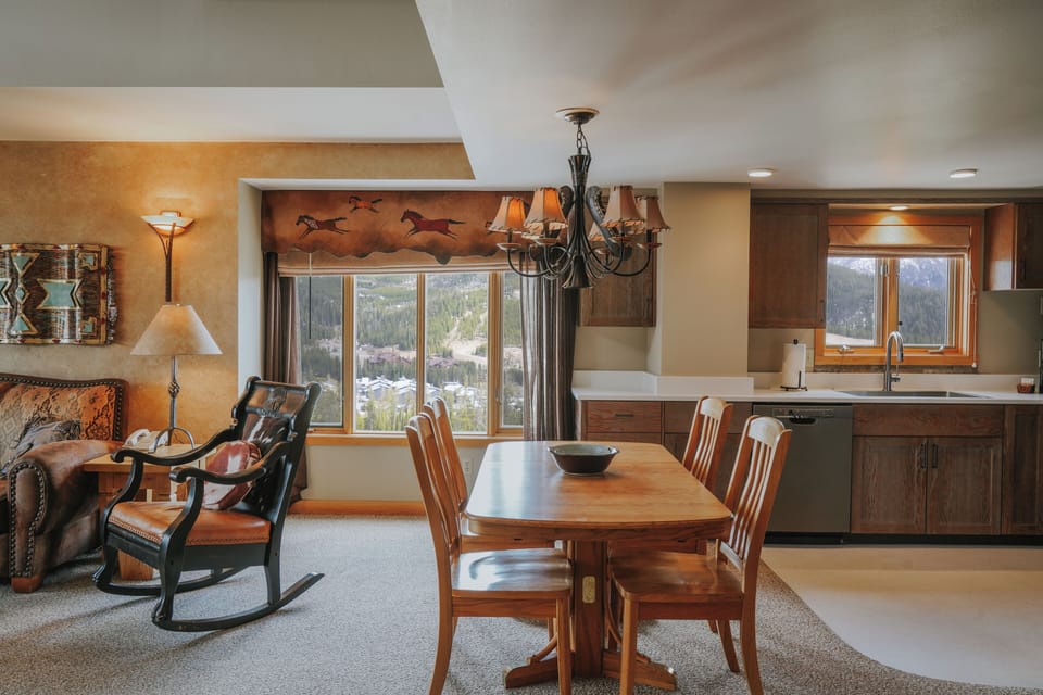 Deluxe Condo | Living area | Flat-screen TV