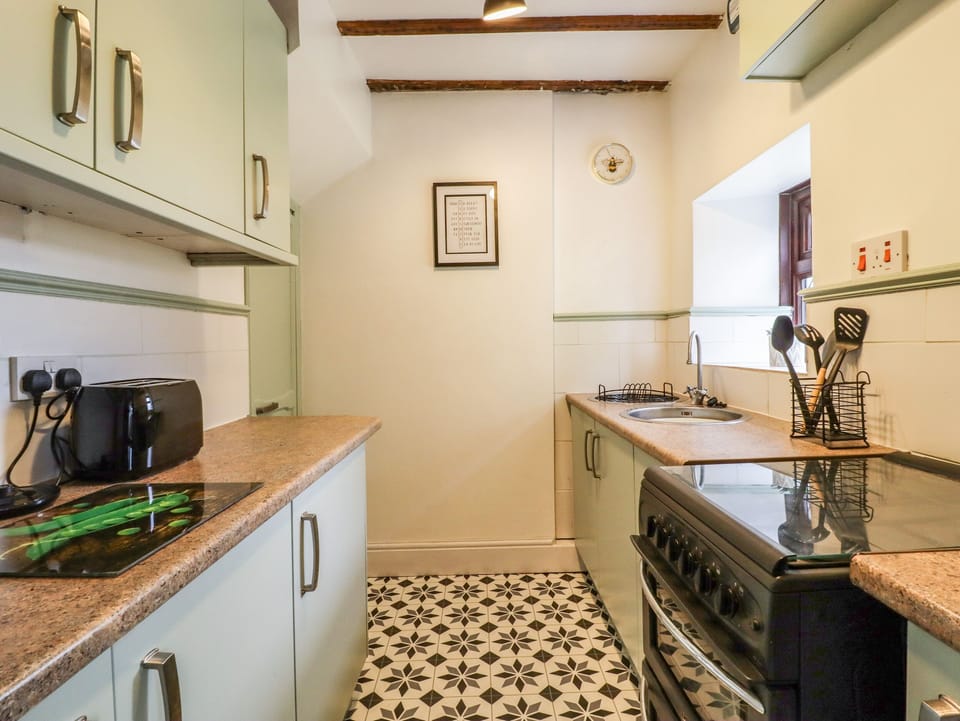 Fridge, electric kettle, toaster, cookware/dishes/utensils