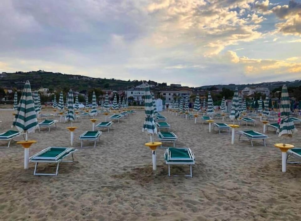 Private beach, sun loungers, beach umbrellas