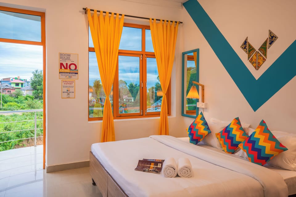 Deluxe Private Room with Premium Balcony and Ensuite Bathroom | Free WiFi, bed sheets