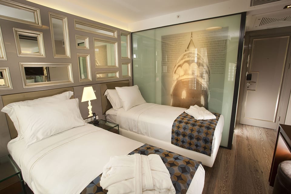 Premium bedding, memory foam beds, minibar, in-room safe