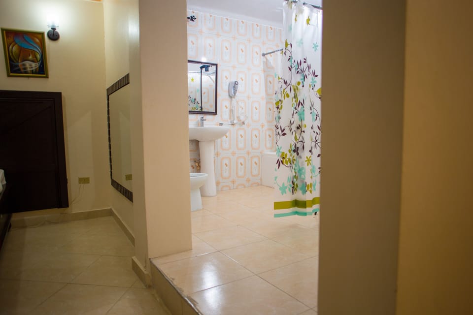 Hair dryer, bathrobes, slippers, towels