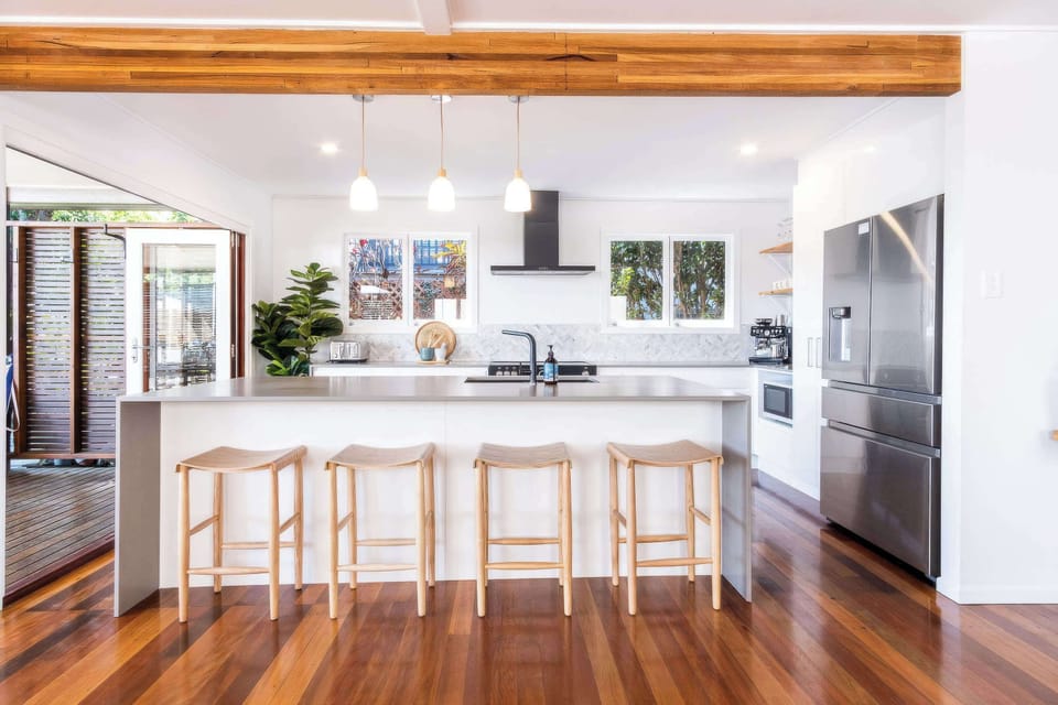 The kitchen opens out onto the deck.