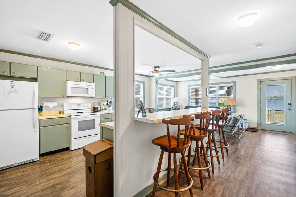 High bar with seating for easy conversation with your cook!  With amazing views