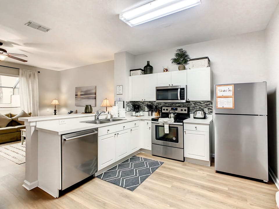 Fully equipped kitchen with modern appliances and plenty of counter space.