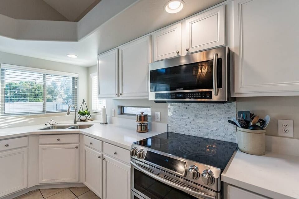 The kitchen features everything necessary to entertain your group, with new stainless steel appliances