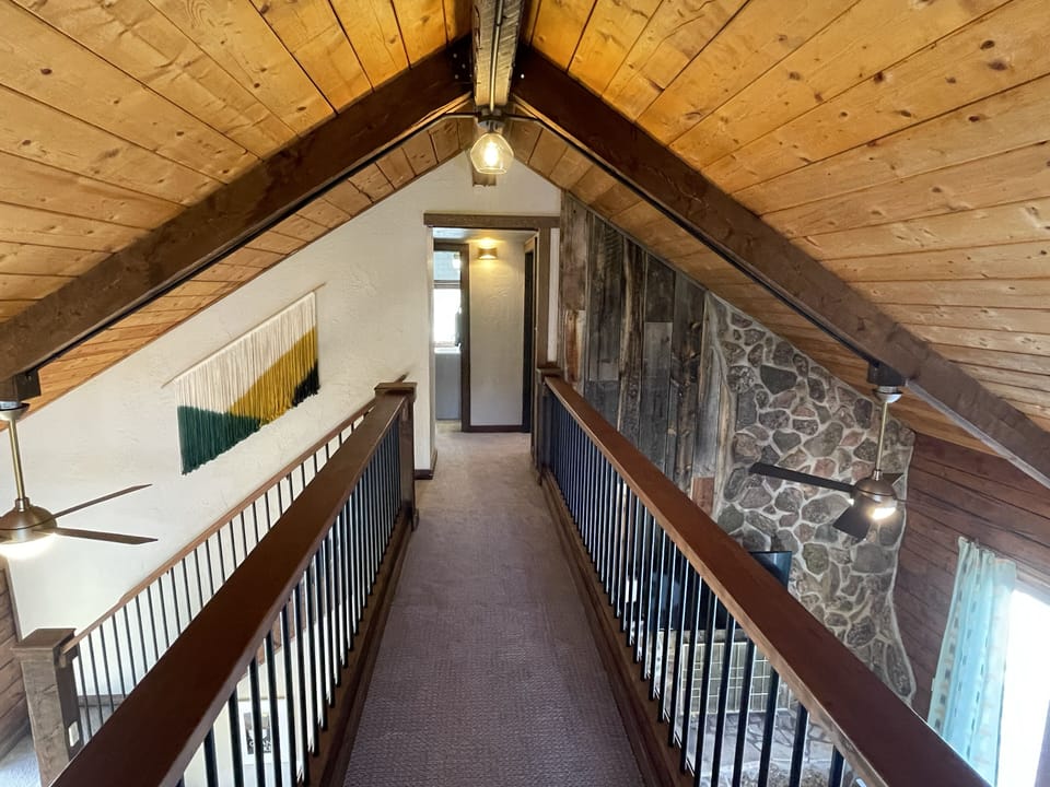 Looking back across the walkway toward the Primary Bedroom, 