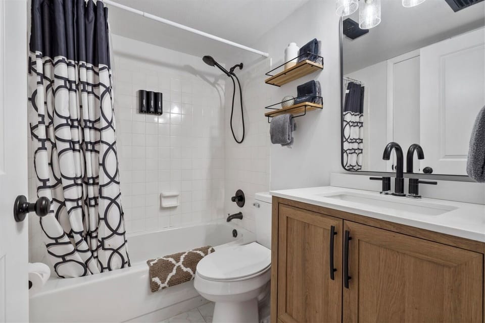 one of two full bathrooms