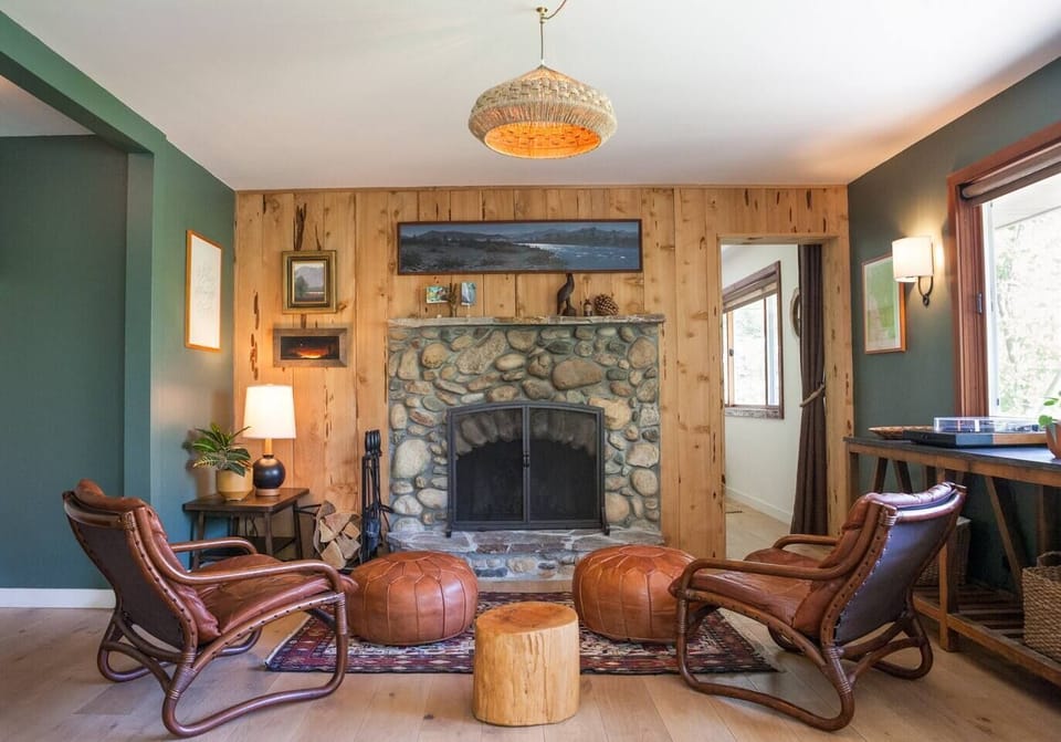 The wood-burning fireplace lounge. Local firewood bundles available for sale at the house.