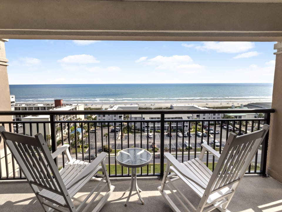 Relax in your private balcony chairs while soaking in stunning ocean views and gentle sea breezes.