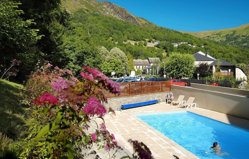 Dive into the lovely seasonal outdoor pool.