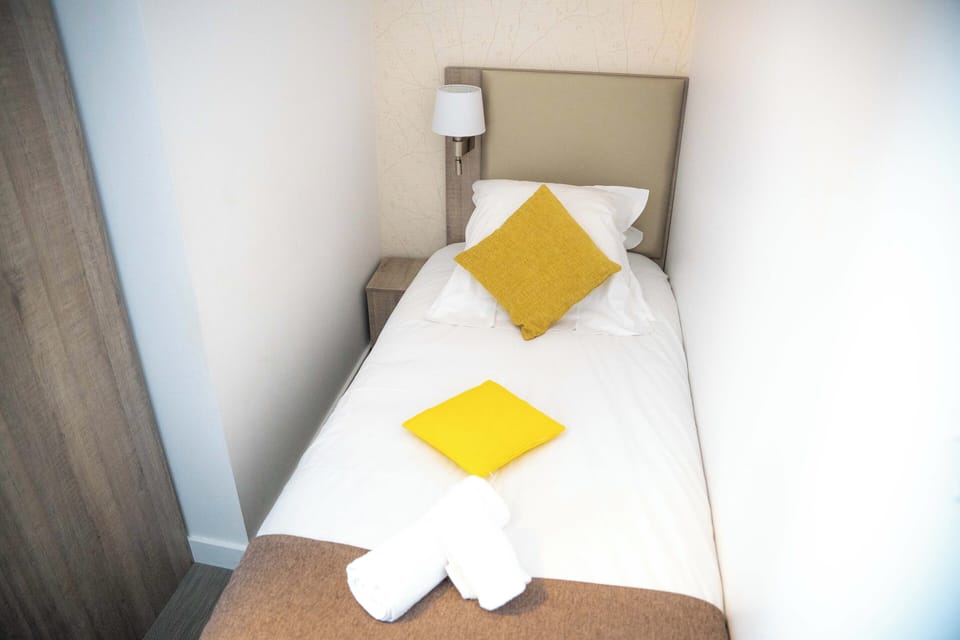 Drift to sleep in a comfortable bed after a wonderful day outside.