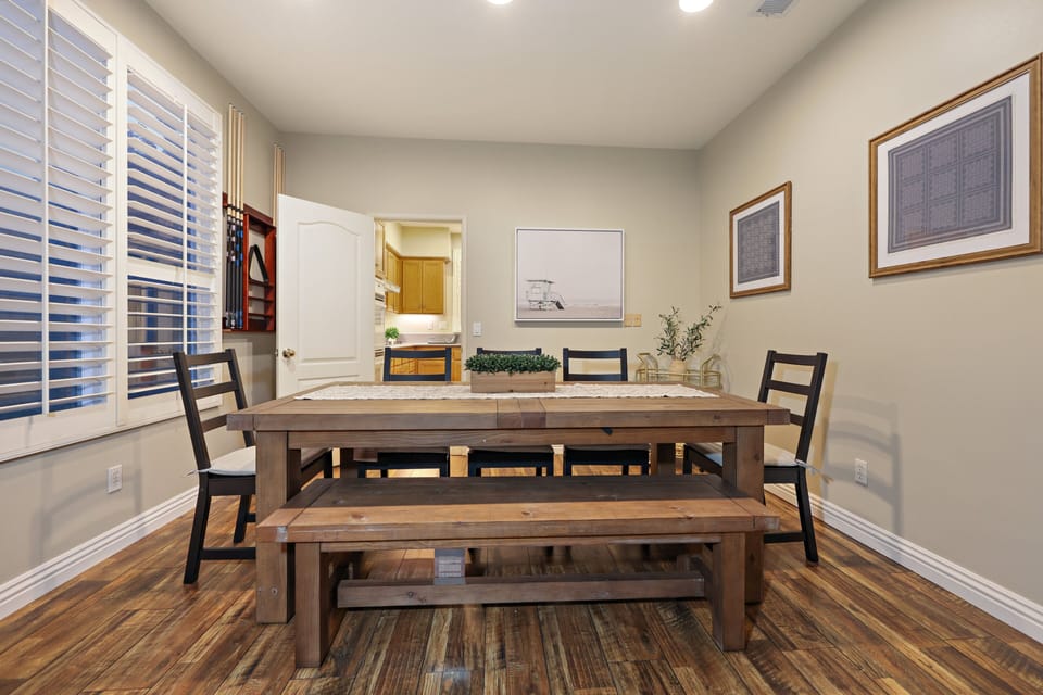 The formal dining room seats up to 8 comfortably.