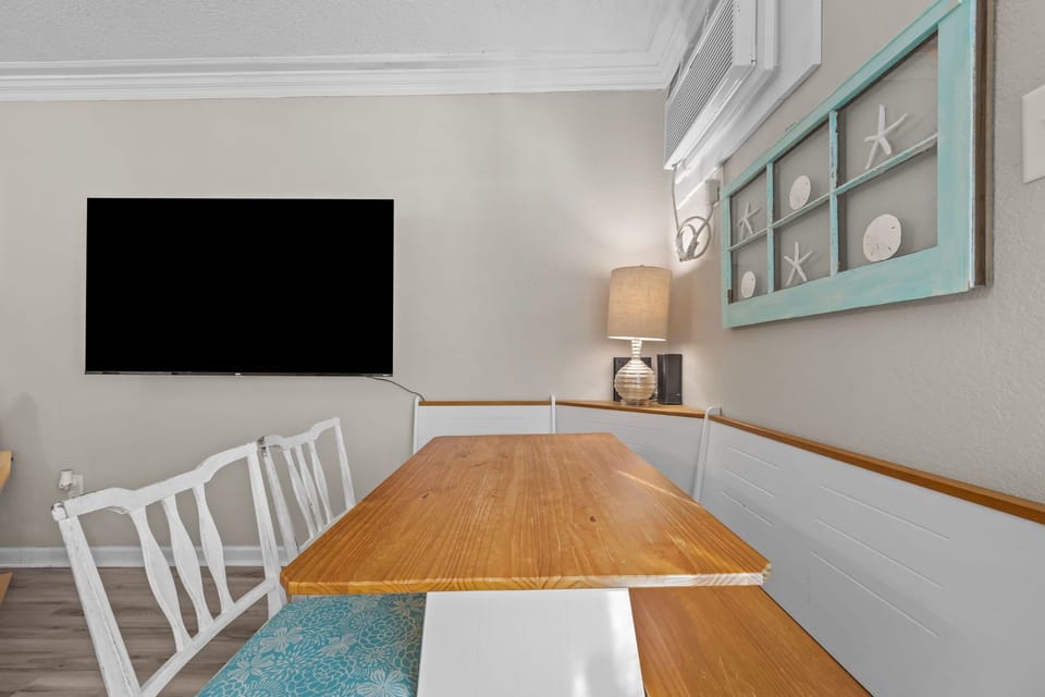 The breakfast nook is one of our favorite additions to this space! We swapped out the small bench with some upcycled chairs and think it really ties the space together!