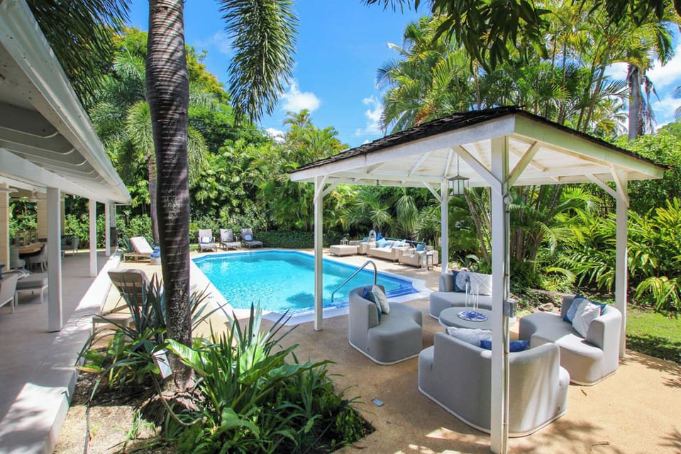 Covered gazebo with comfy lounge chairs - every spot is designed with max comfort