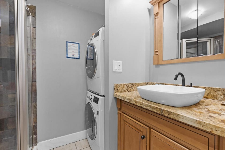 Guest Bathroom with washer and dryer