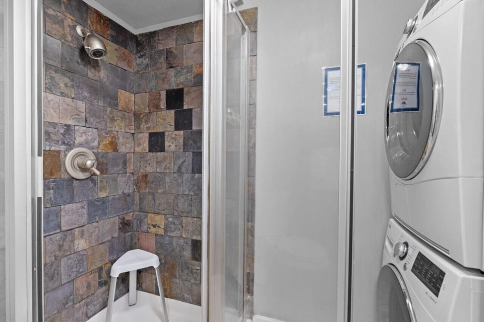 Guest Bathroom with washer and dryer