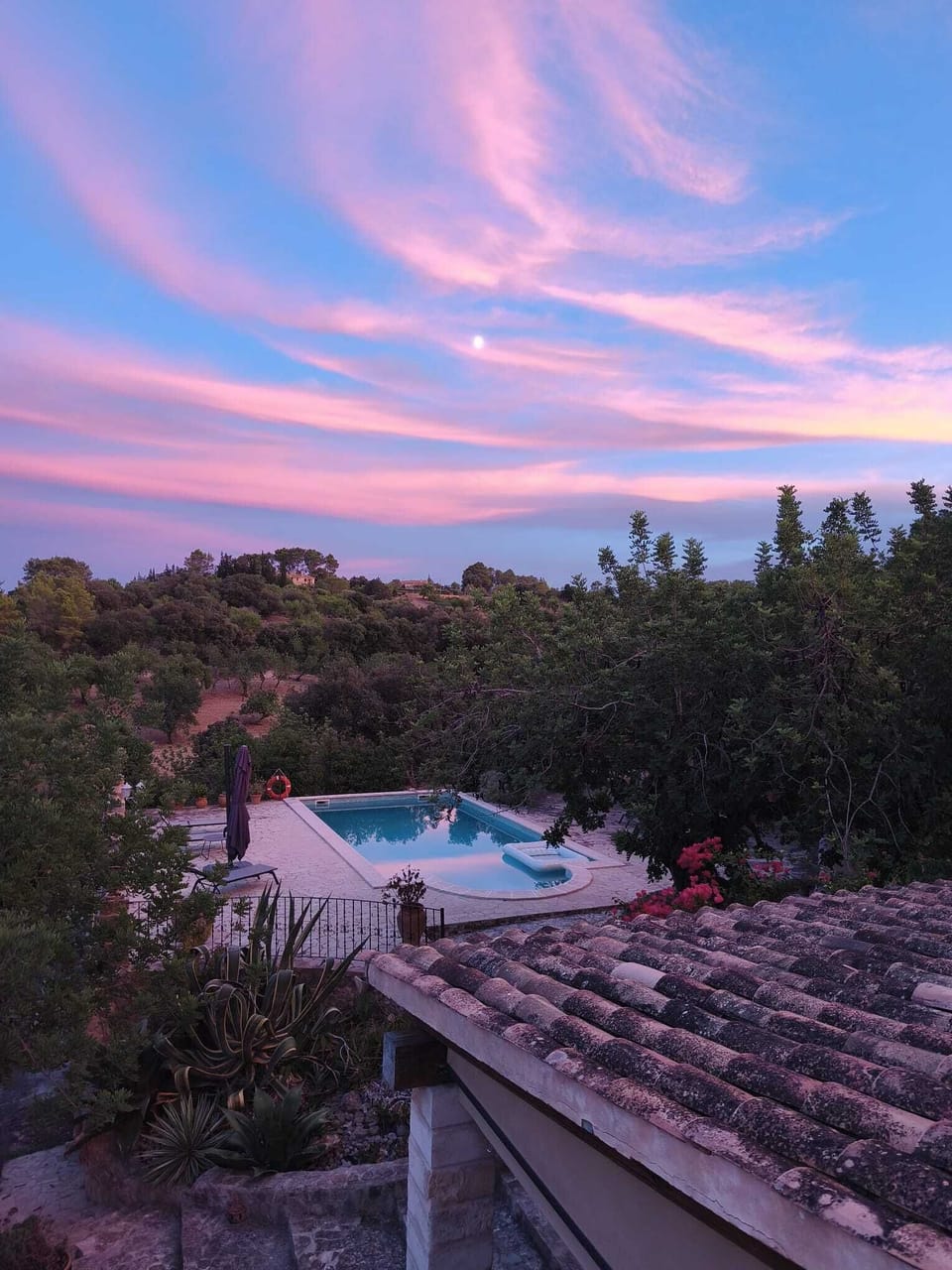 Pool view from first floor balcony in the sun rise