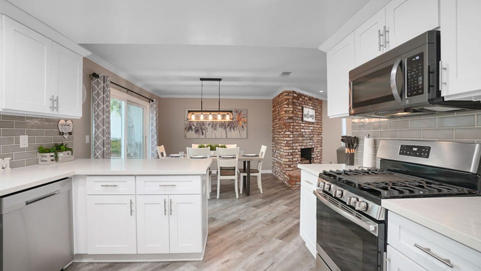 Open concept kitchen/ dinning room/ living room