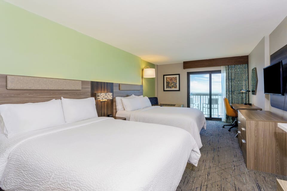 Pillowtop beds, in-room safe, desk, laptop workspace