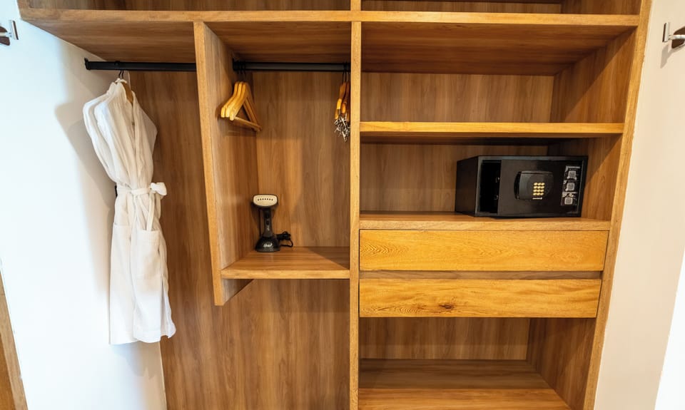 Junior Suite Ocean Front | Minibar (free items), in-room safe, iron/ironing board, WiFi (free)
