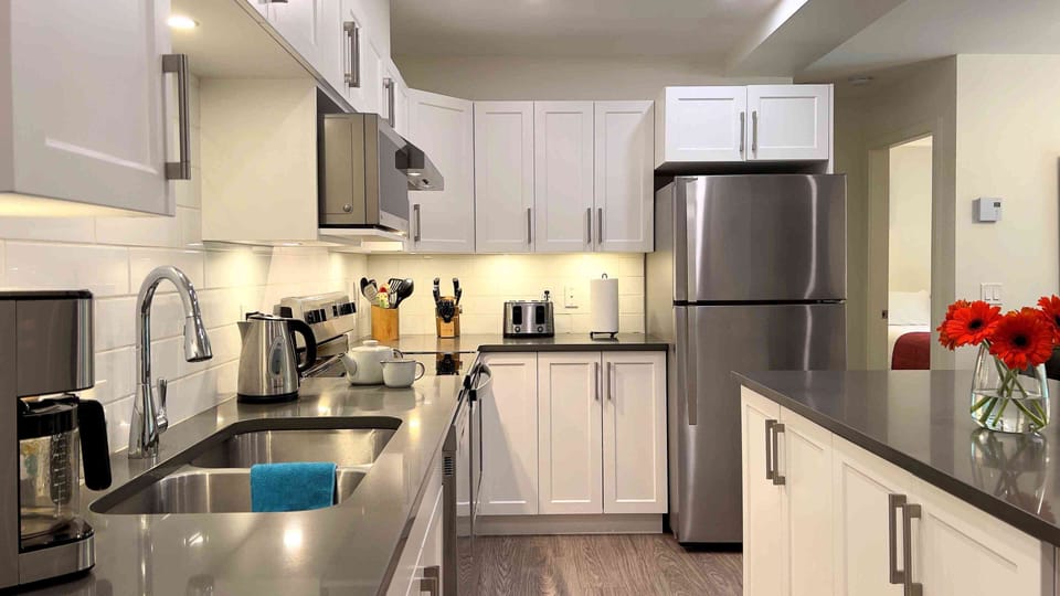 Orford Condo | Private kitchen | Coffee/tea maker, full-size fridge, microwave, oven