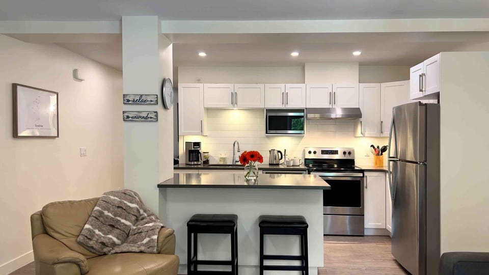 Orford Condo | Private kitchen | Coffee/tea maker, full-size fridge, microwave, oven