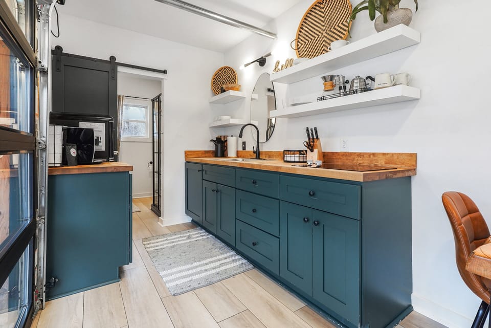 Spacious kitchen with everything you may need including a start of the art Jura coffee maker!  Enjoy the Guatemalan coffee beans from the family farm we personally visited last year. The smooth espresso created is unbelievably delightful!