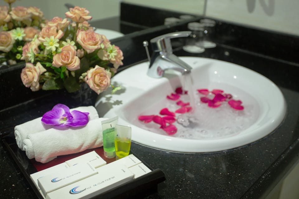 Shower, free toiletries, hair dryer, slippers