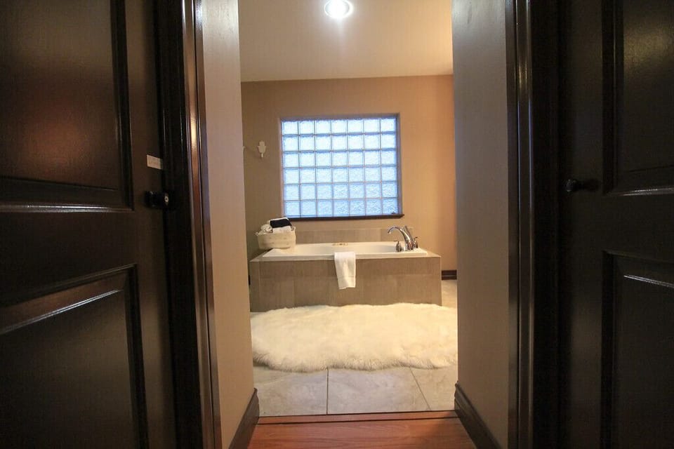 View of the bathroom from The Golden bedroom