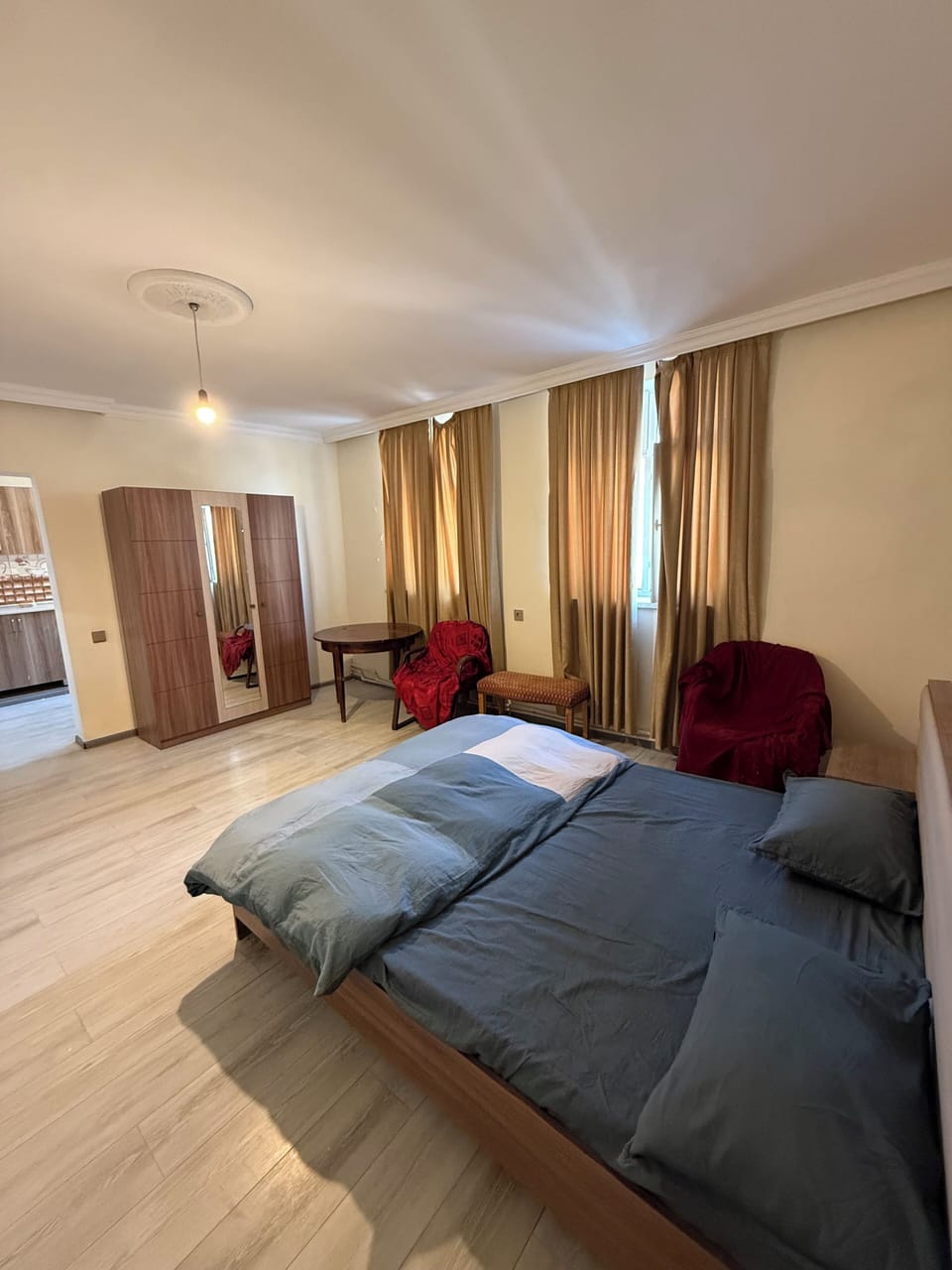 Family Room, Kitchen, Garden Area | Laptop workspace, iron/ironing board, free WiFi, bed sheets