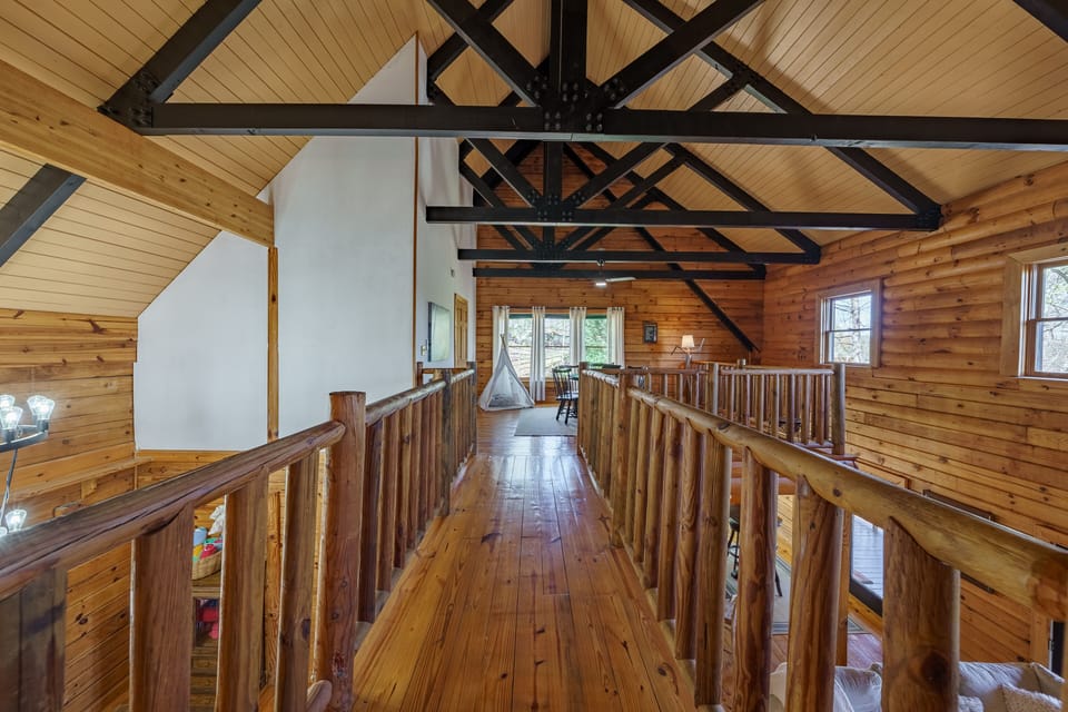 Stunning architectural view from the top master bedroom overlooking the loft