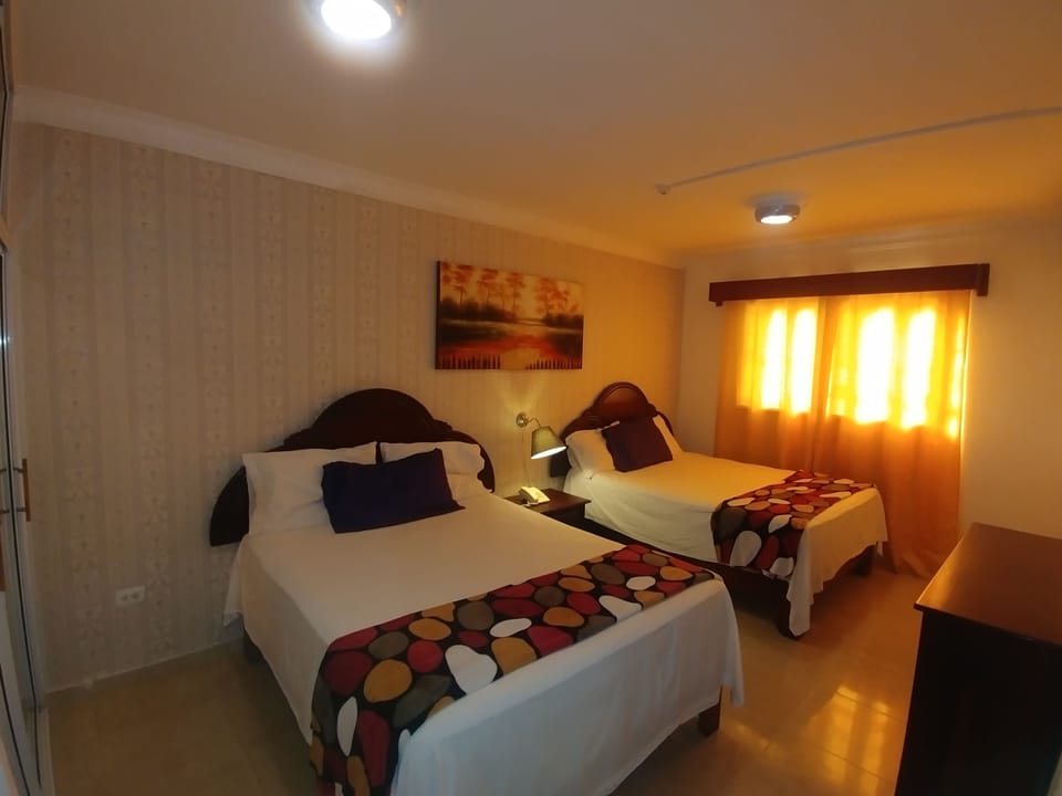 Basic Room, 2 Queen Beds | Pillowtop beds, minibar, in-room safe, WiFi (free)