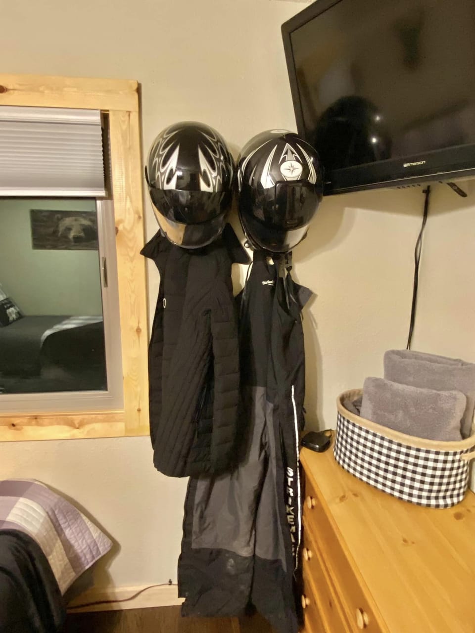 Helmet and jacket hooks in bedrooms.