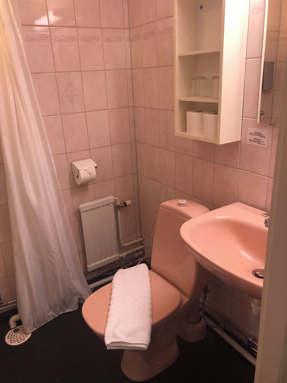 Shower, hair dryer, towels, toilet paper