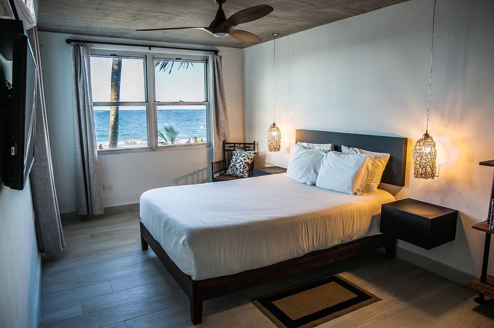Deluxe Room, King or Queen, Ocean View | Hypo-allergenic bedding, down comforters, memory foam beds, in-room safe