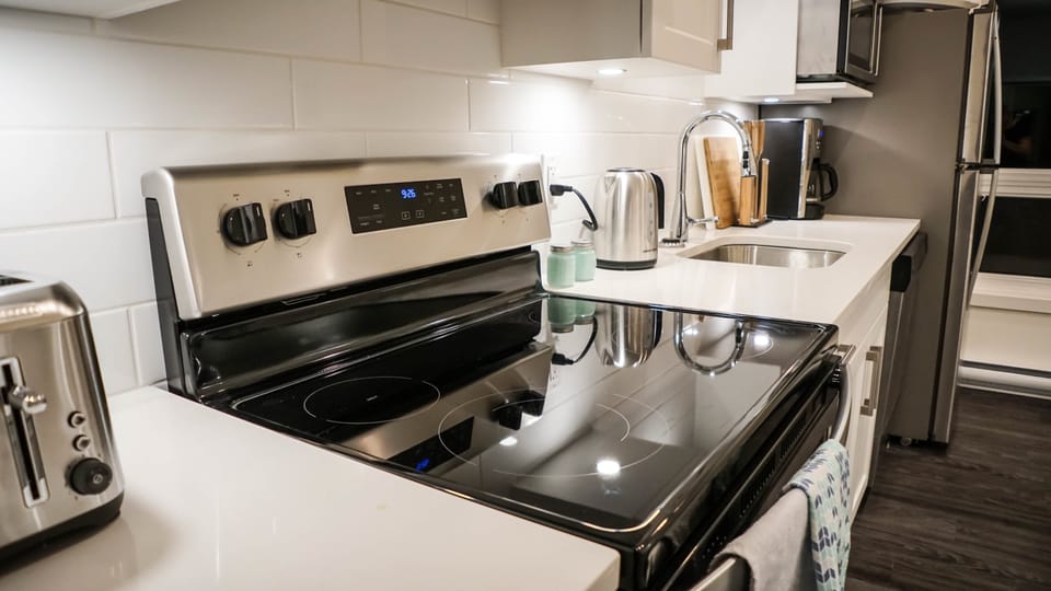 The Revy Den | Private kitchen | Coffee/tea maker, full-size fridge, microwave, oven