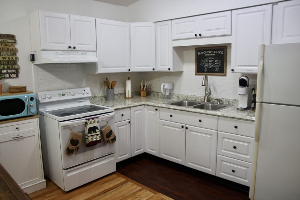 Full kitchen stocked with all you need to live comfortably.