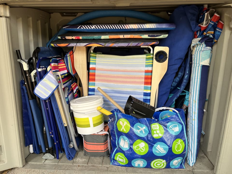 Storage Unit With Beach Chairs, and Beach Umbrella Provided Under Villa. 
