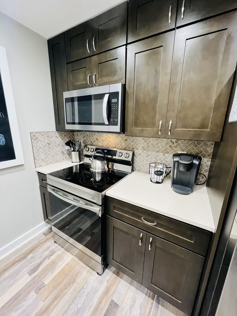 New Flooring, Lighting, Appliances, Back Splash, and Cabinets. 