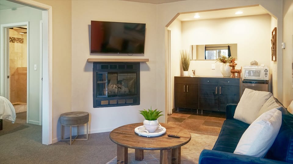 Deluxe Suite | Living room | 50-inch Smart TV with digital channels, TV, Netflix