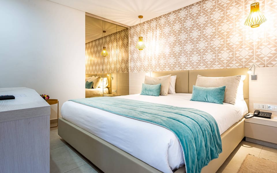 Junior Suite, Hot Tub, Pool View | Premium bedding, minibar, in-room safe, desk