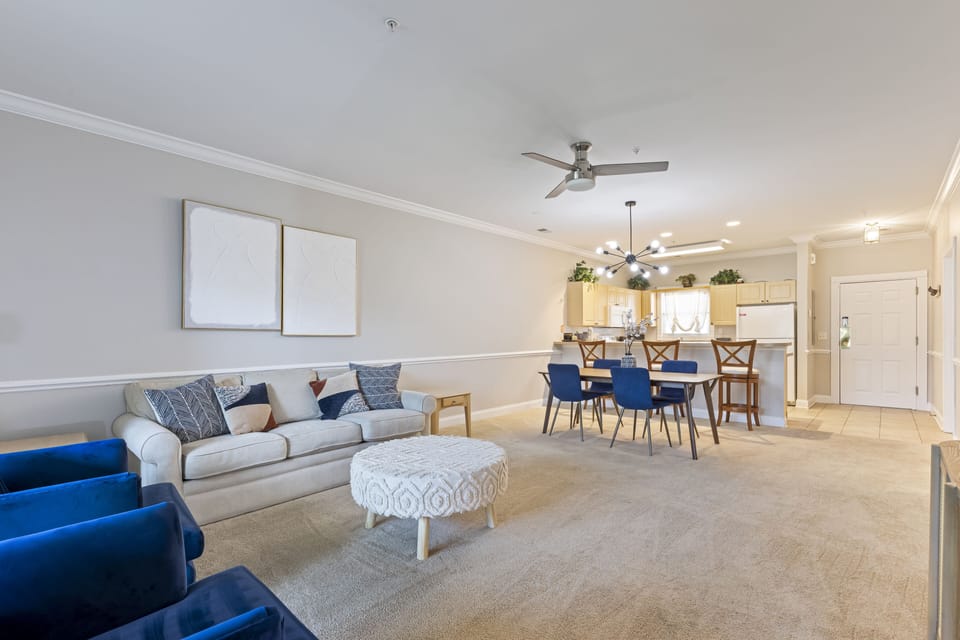 Signature Condo, 2 Bedrooms, Patio, Pool View | Living room | 55-inch flat-screen TV with cable channels, TV