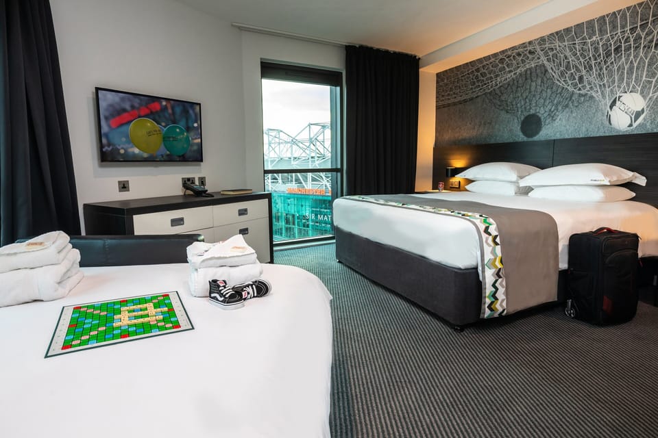Room, 1 King Bed with Sofa bed (View) | Free minibar, in-room safe, desk, blackout drapes