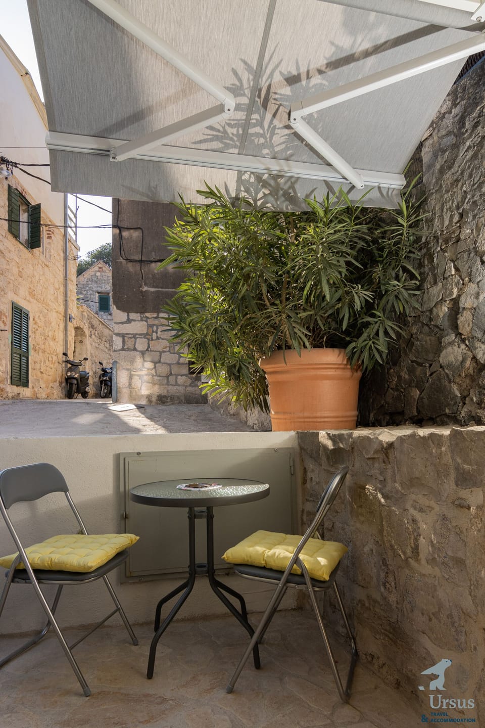 Small outdoor area with an outdoor furniture